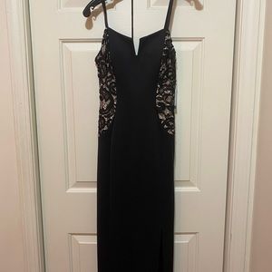 Black prom dress with slit never worn,still has tag